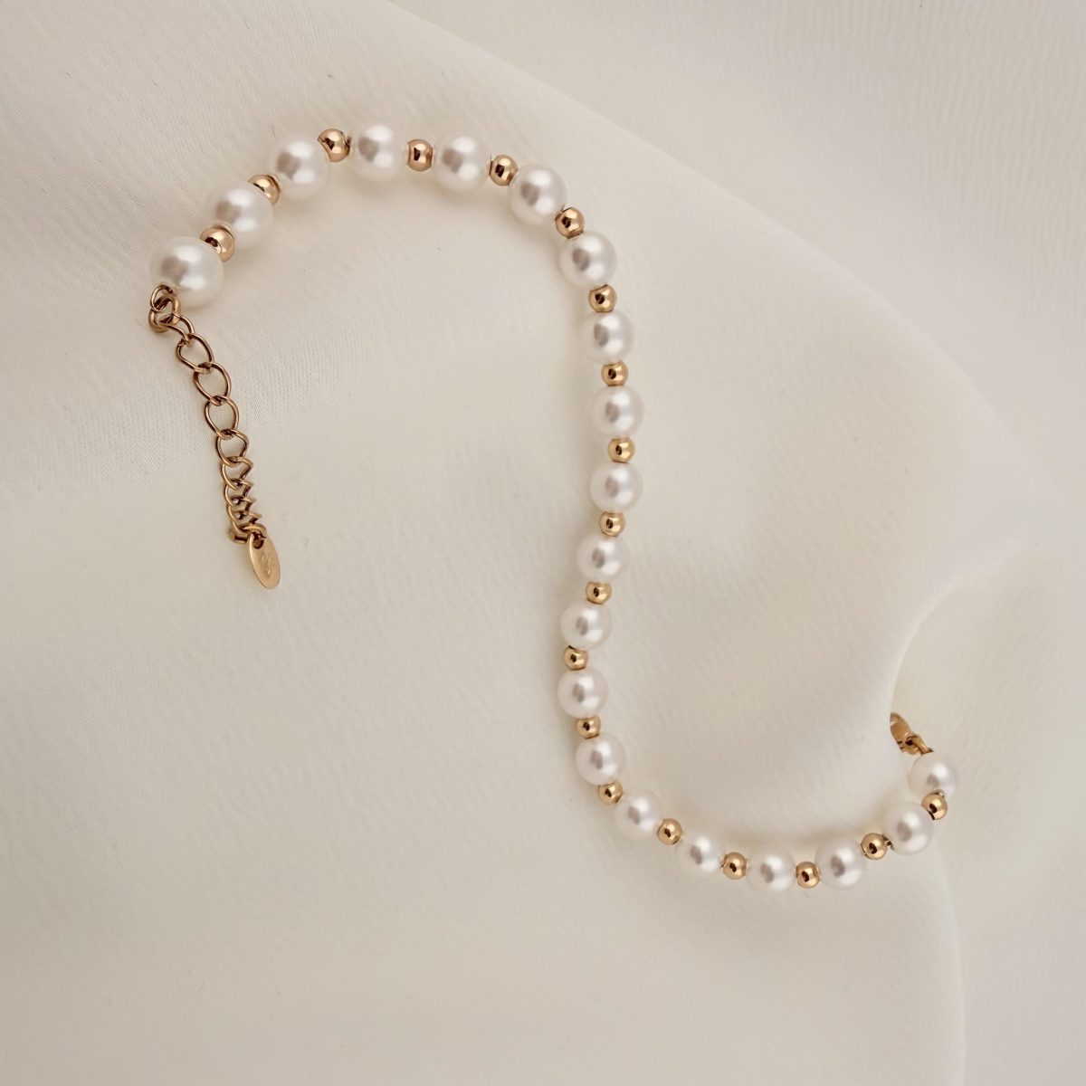 دستبند مرواریدی ژوپینگ مدل X001235157 - دیدی کالا | DiDikala
